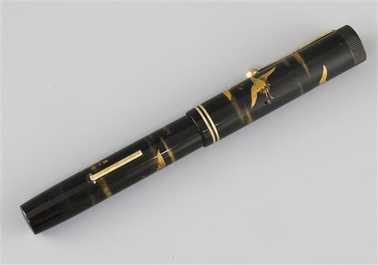 A Dunhill Namiki black lacquered fountain pen, 5.25in.